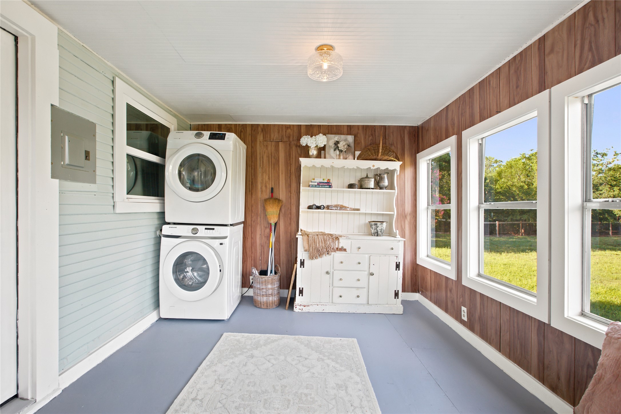 372 Old Lockhart Road Lockhart, TX 78644 - Photo 31 of 40 Ample natural light illuminates this spacious laundry area.