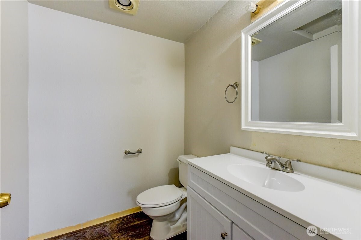 6629 204th Street Southwest Lynnwood, WA 98036 - Photo 12 of 17 a bathroom with a sink and a toilet