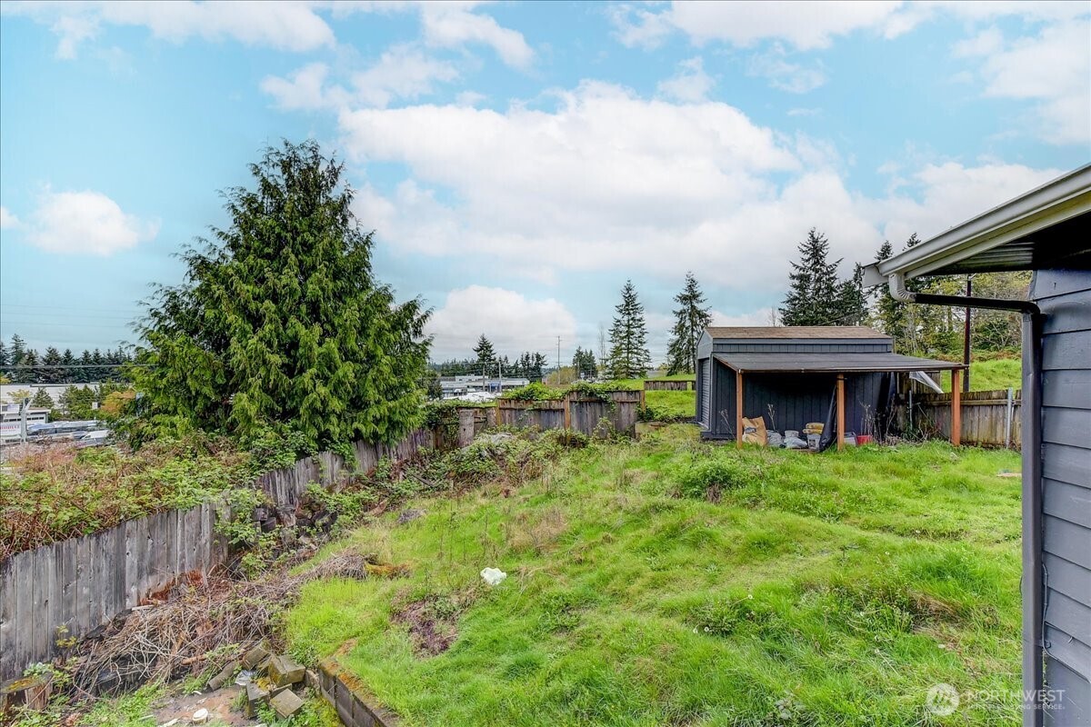 6629 204th Street Southwest Lynnwood, WA 98036 - Photo 16 of 17 a view of a garden with an outdoor seating