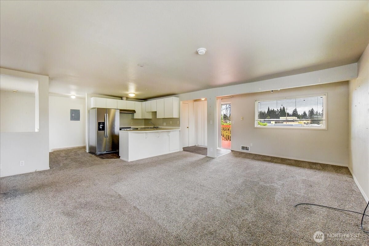 6629 204th Street Southwest Lynnwood, WA 98036 - Photo 2 of 17 a view of empty room with wooden floor