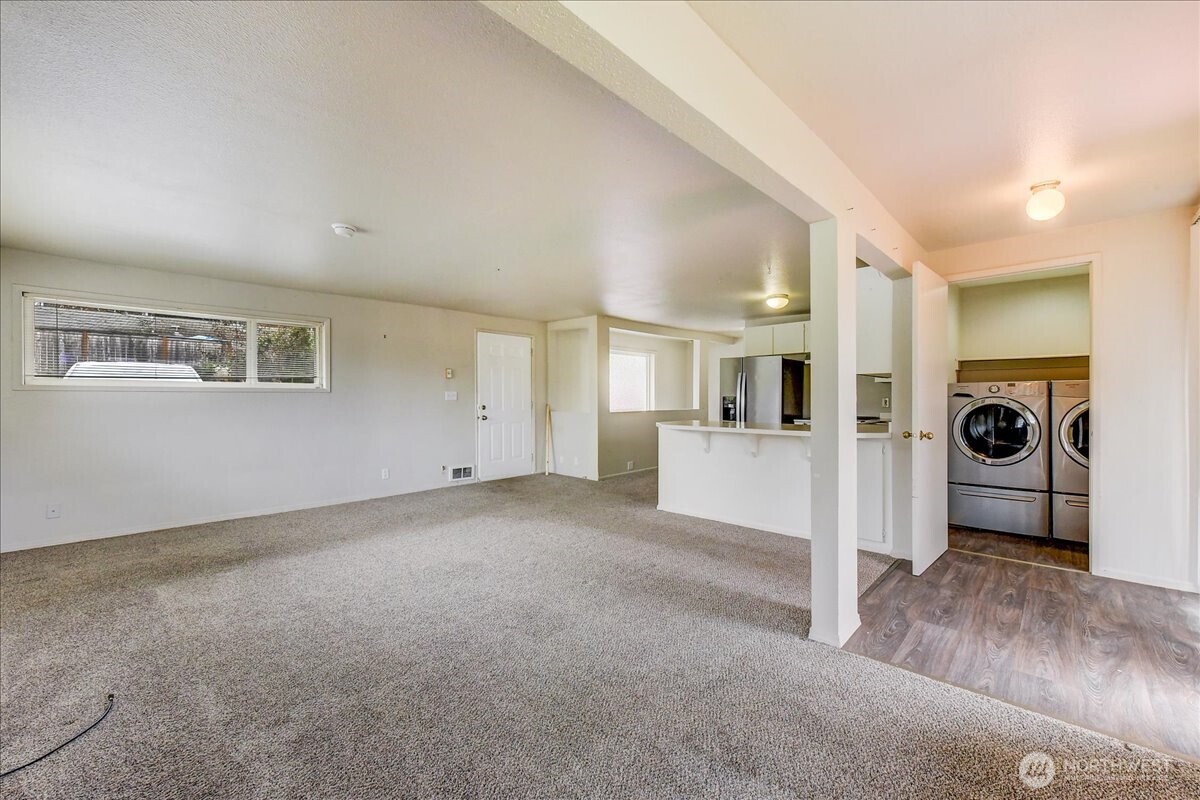 6629 204th Street Southwest Lynnwood, WA 98036 - Photo 3 of 17 a view of a big room with closet and windows