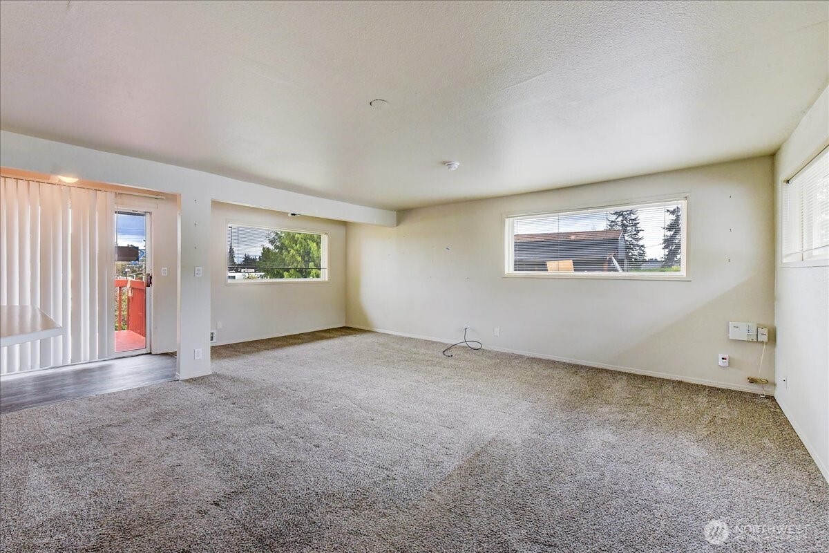 6629 204th Street Southwest Lynnwood, WA 98036 - Photo 4 of 17 an empty room with a empty space and windows