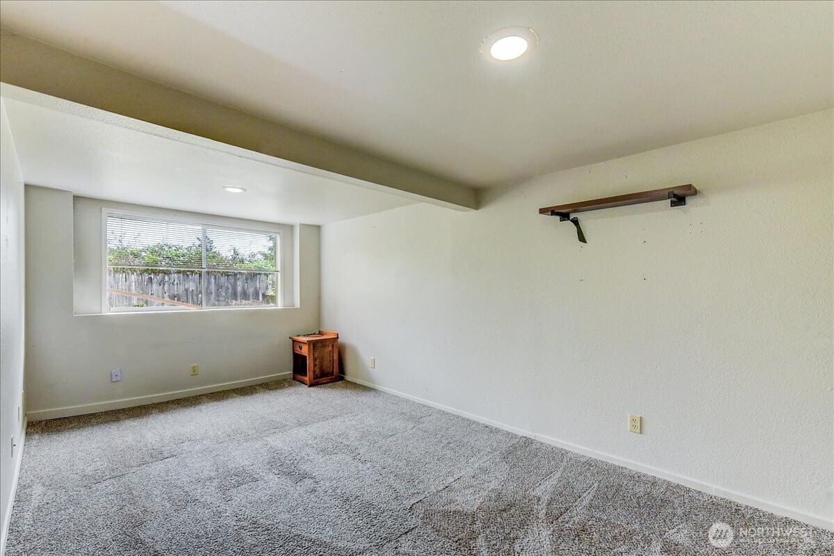 6629 204th Street Southwest Lynnwood, WA 98036 - Photo 7 of 17 an empty room with windows