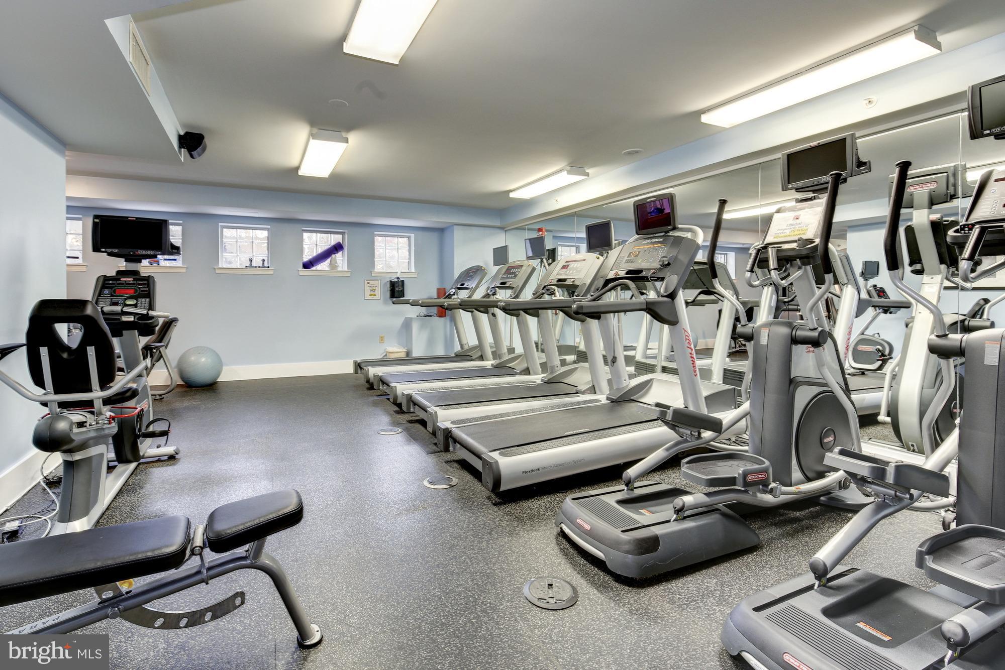 555 Massachusetts Avenue Northwest, Unit 1008 Washington, DC 20001 - Photo 14 of 15 a view of a room with gym equipment