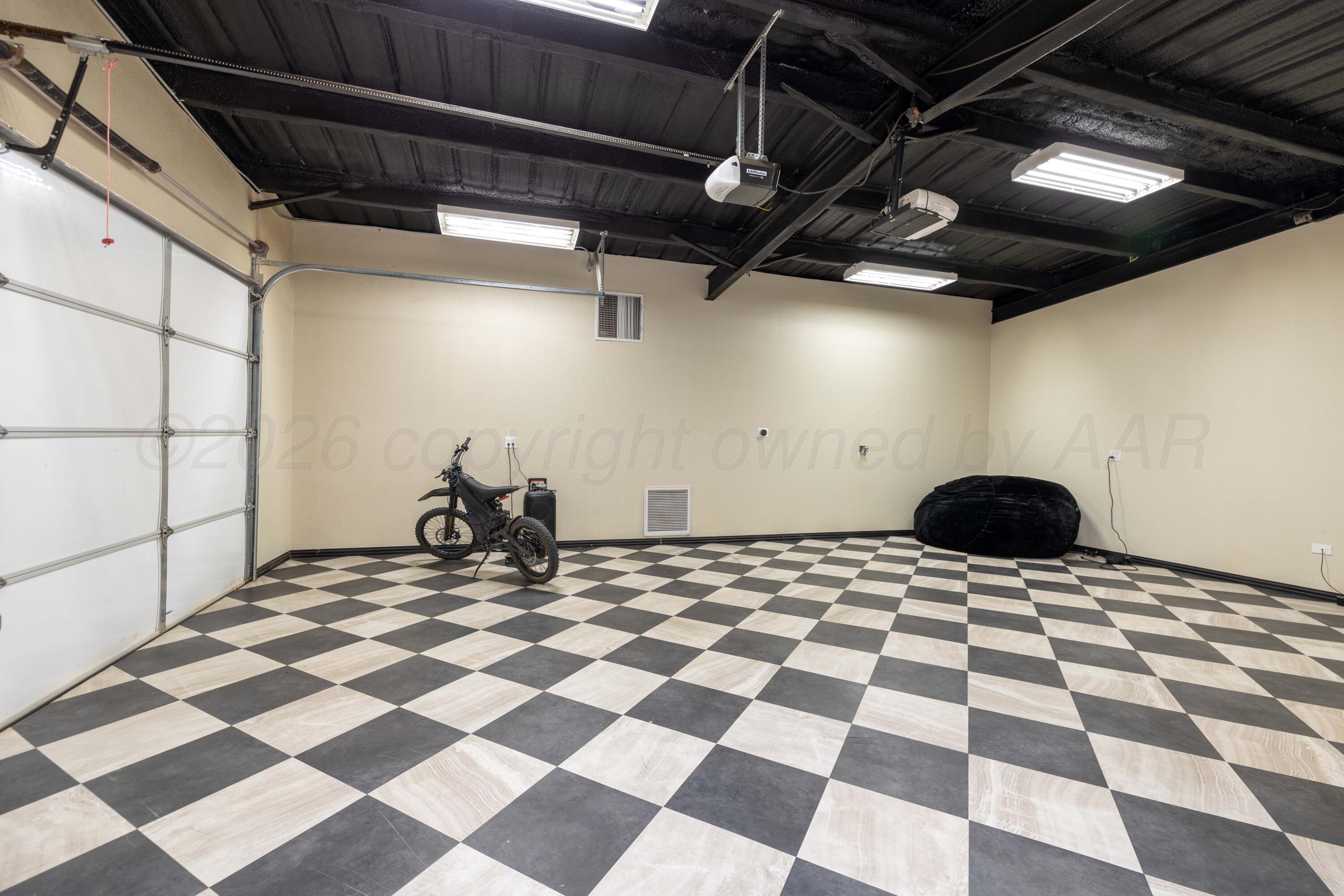 15201 Helium Road Amarillo, TX 79119 - Photo 43 of 61 a black and white checkered floor