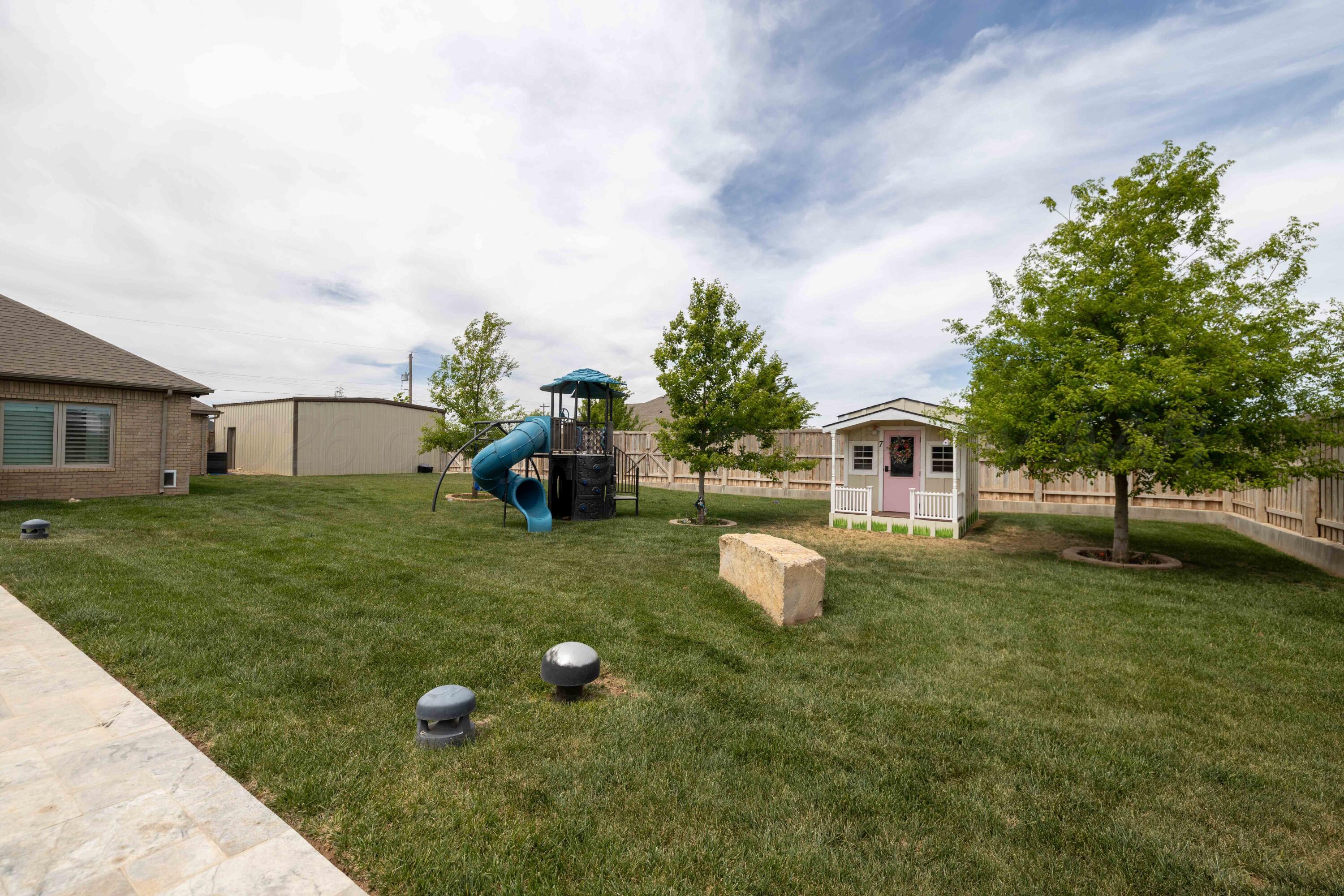 15201 Helium Road Amarillo, TX 79119 - Photo 45 of 61 a view of a house with a backyard