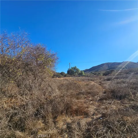 a view of mountain view with lots of trees