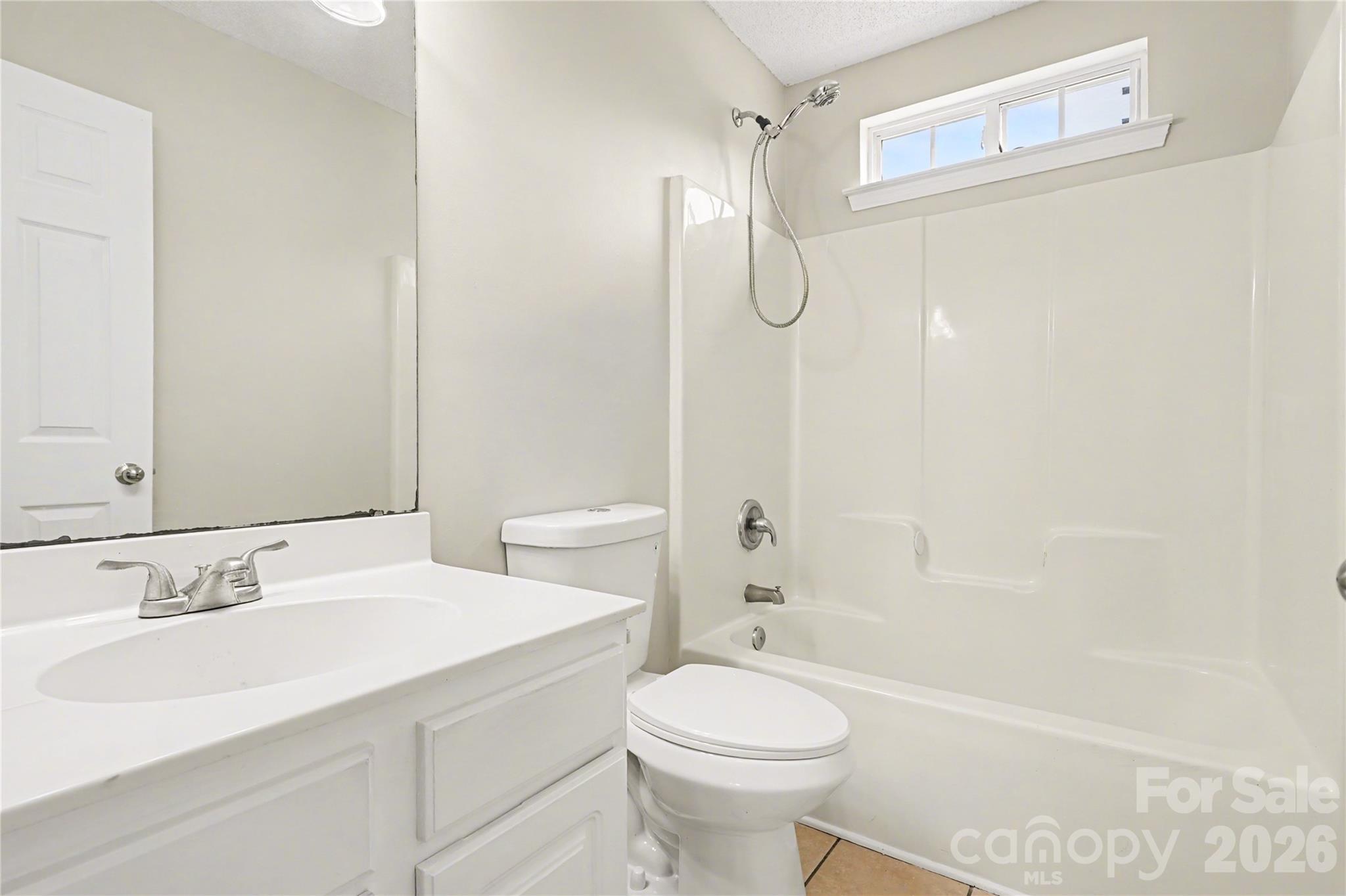 117 North Tanninger Road Mount Holly, NC 28120 - Photo 9 of 10 a bathroom with a sink a toilet and shower