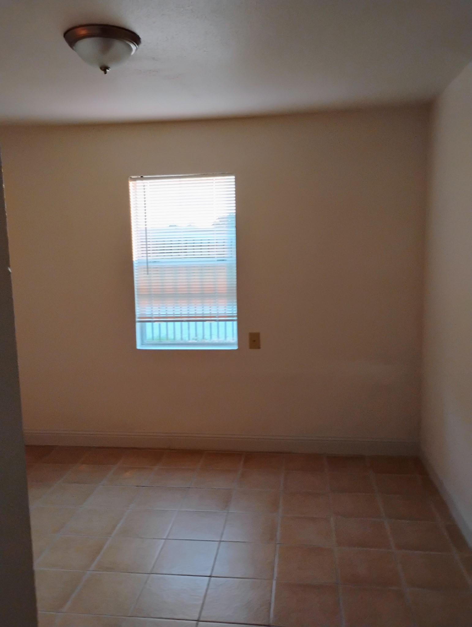 3002 Market Street, Unit 2 Houston, TX 77020 - Photo 11 of 13 an empty room with a window