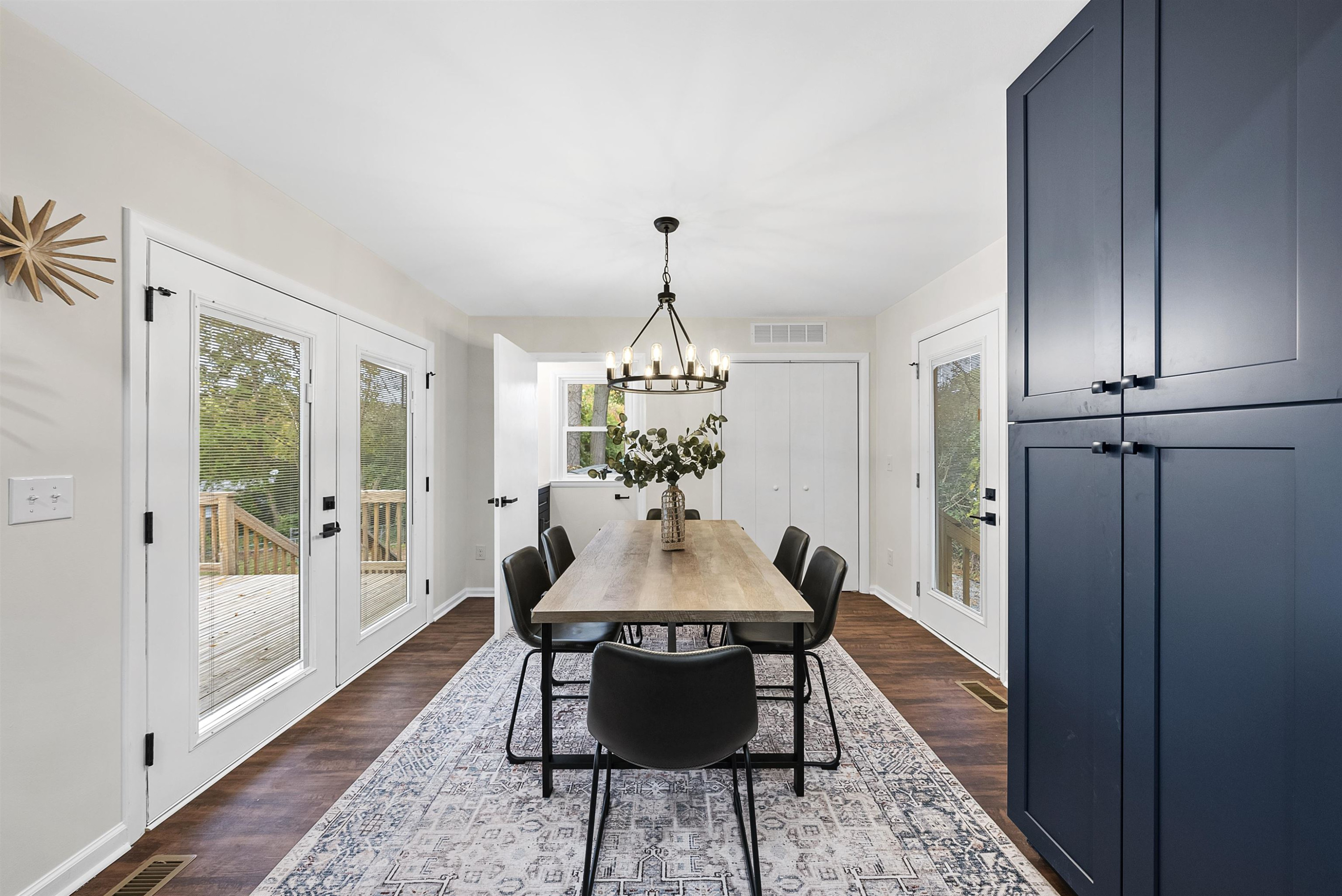 3128 Brentwood Road Raleigh, NC 27604 - Photo 12 of 28 a view of a dining room with furniture window and wooden floor