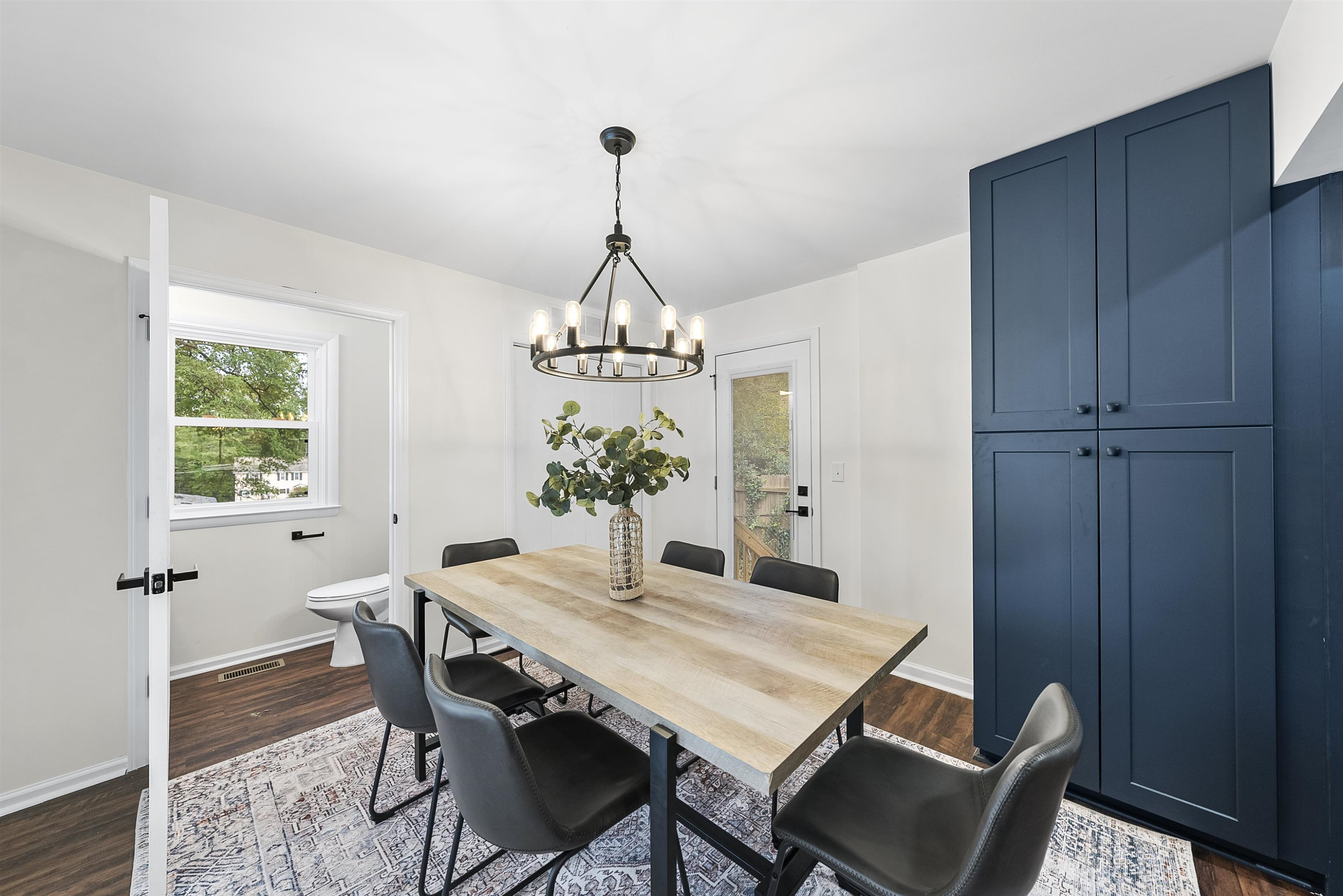3128 Brentwood Road Raleigh, NC 27604 - Photo 13 of 28 a view of a dining room with a table and chairs