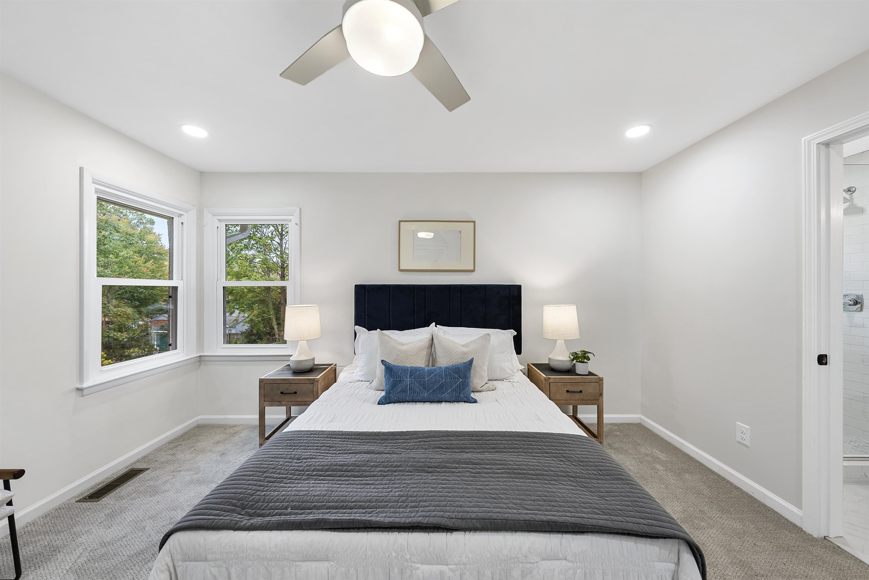 3128 Brentwood Road Raleigh, NC 27604 - Photo 23 of 28 a bedroom with a bed and window