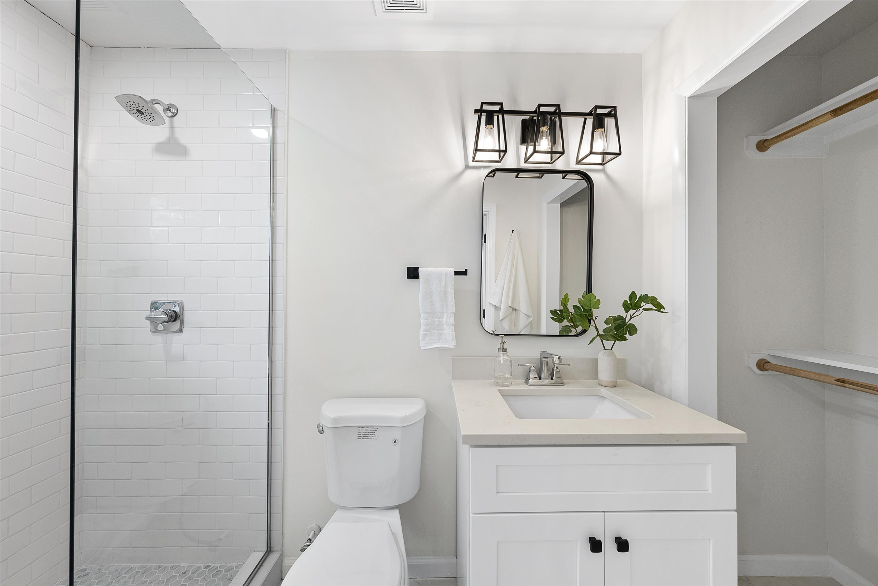 3128 Brentwood Road Raleigh, NC 27604 - Photo 25 of 28 a bathroom with a sink toilet and shower