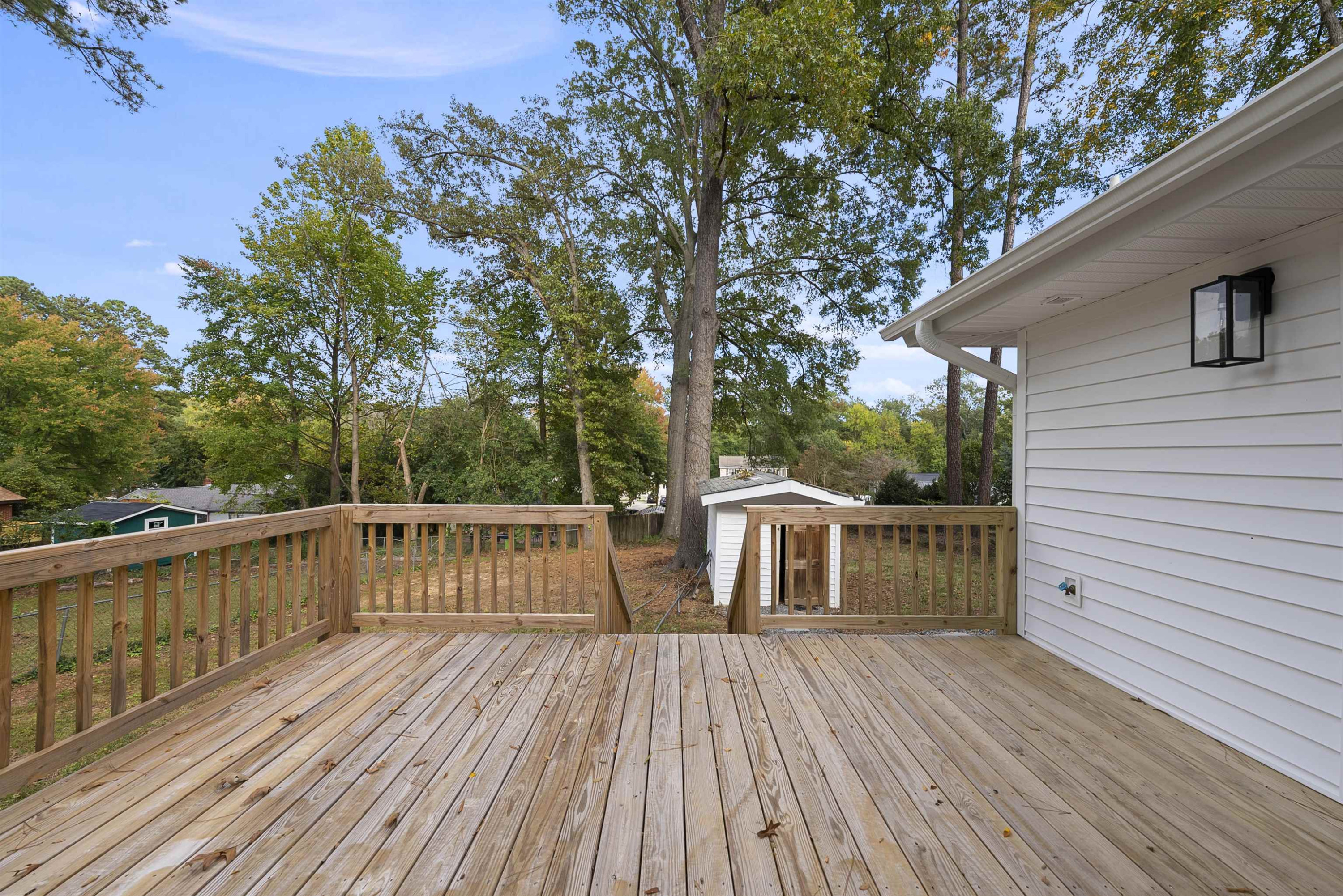 3128 Brentwood Road Raleigh, NC 27604 - Photo 26 of 28 a view of balcony with deck and wooden floor