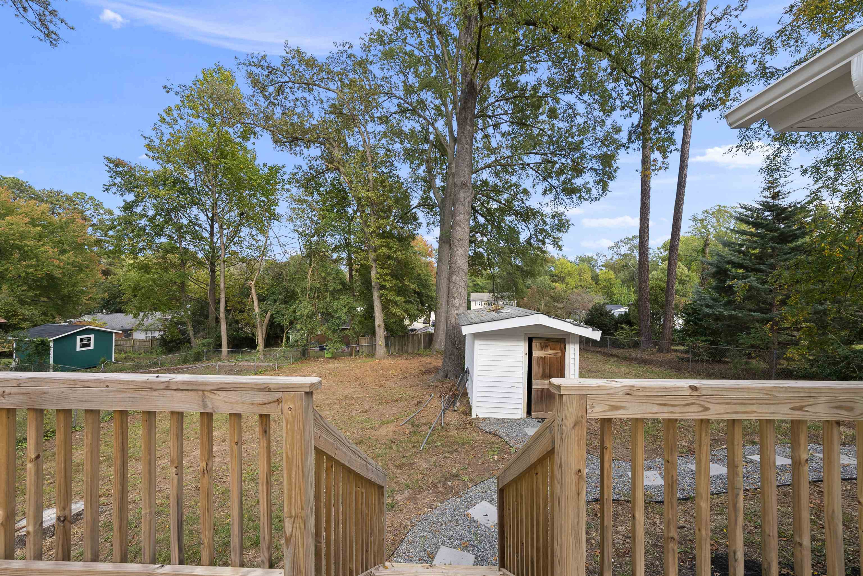 3128 Brentwood Road Raleigh, NC 27604 - Photo 27 of 28 a view of a house with a backyard