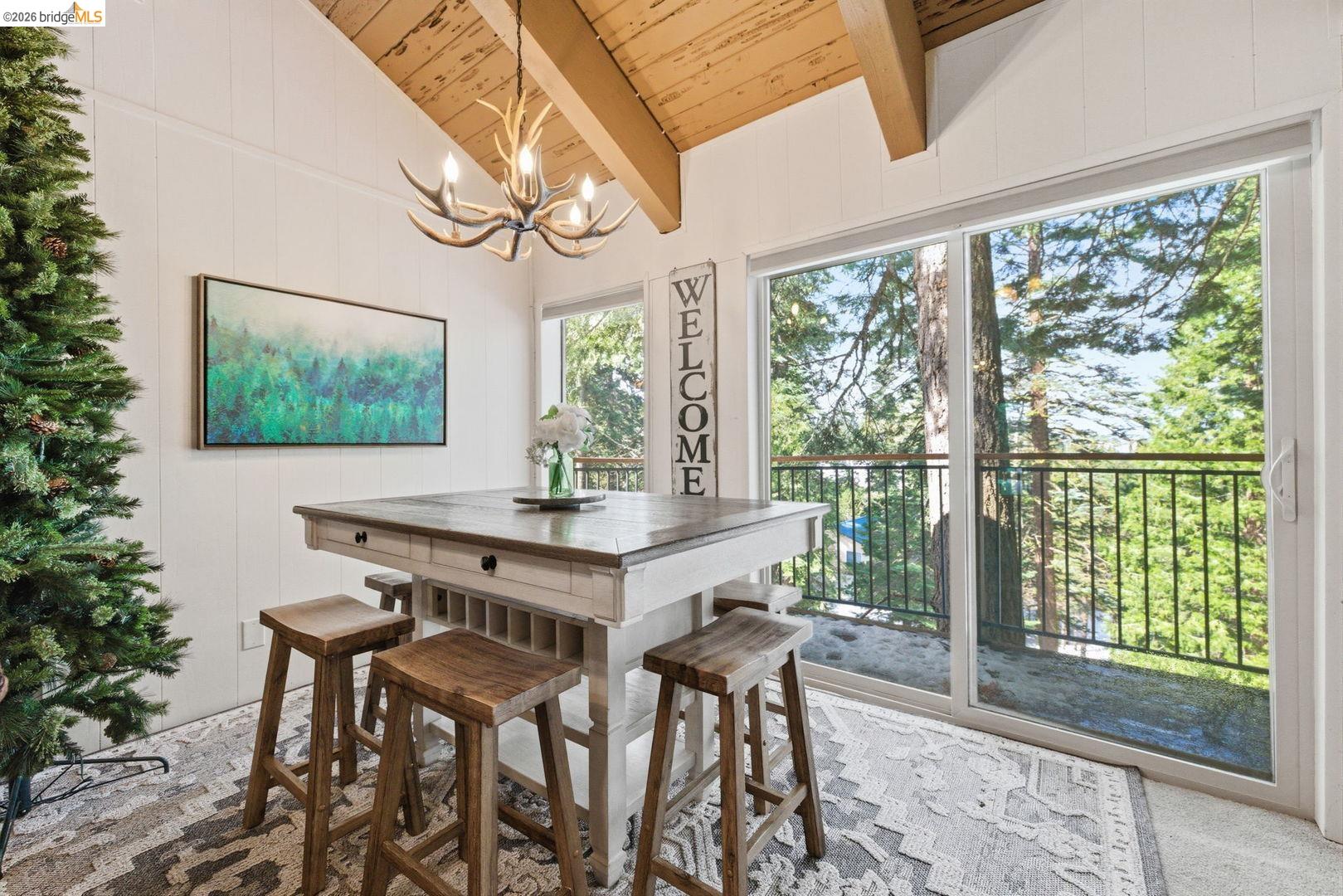33840 Upper Leland Road, Unit 25A Pinecrest, CA 95364 - Photo 6 of 41 a view of a dining room with furniture window and outside view