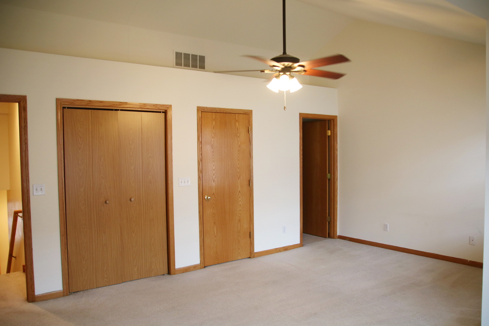 624 South Peace Road, Unit 624 Sycamore, IL 60178 - Photo 7 of 14 a view of an empty room with a fan
