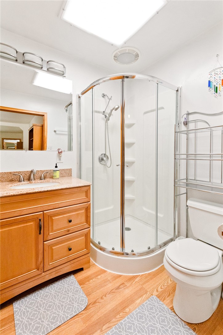 16366 Morro Road Atascadero, CA 93422 - Photo 21 of 69 a bathroom with a granite countertop sink toilet and shower