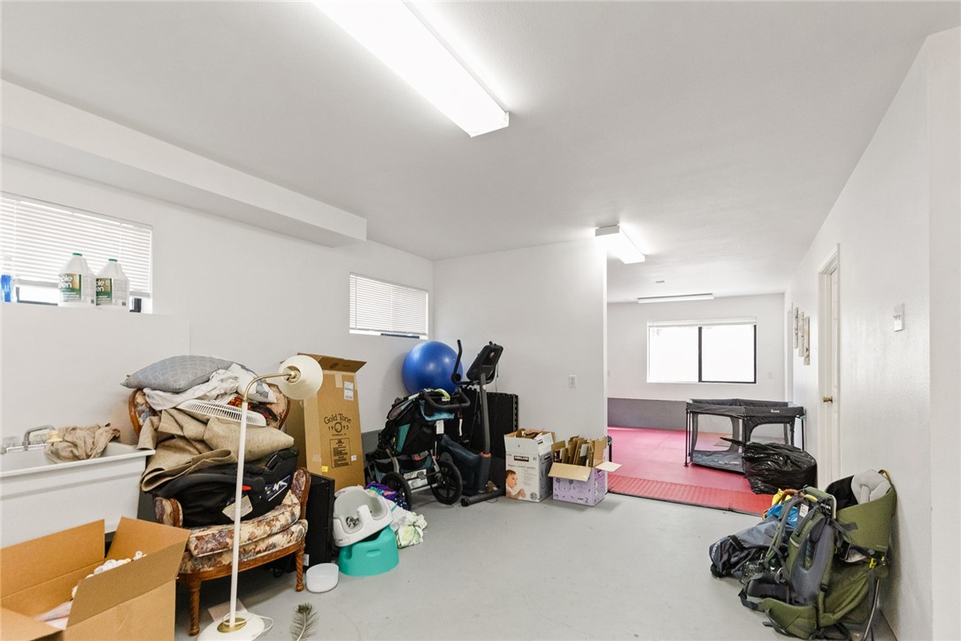 16366 Morro Road Atascadero, CA 93422 - Photo 35 of 69 a bedroom with furniture and a gym equipment