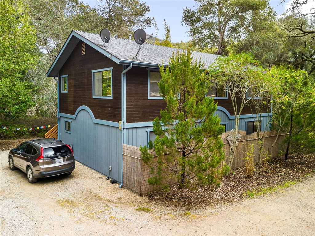 16366 Morro Road Atascadero, CA 93422 - Photo 47 of 69 a car parked in front of a house