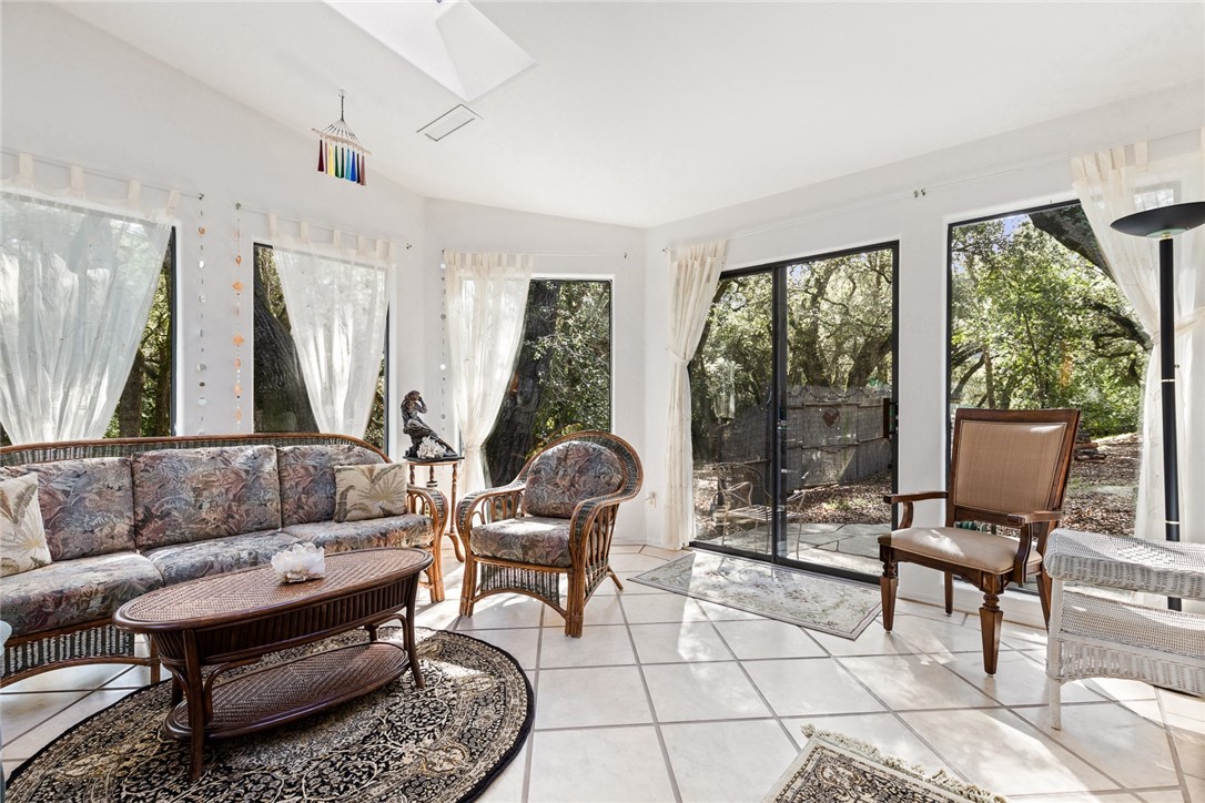 16366 Morro Road Atascadero, CA 93422 - Photo 7 of 69 a living room with furniture and a floor to ceiling window