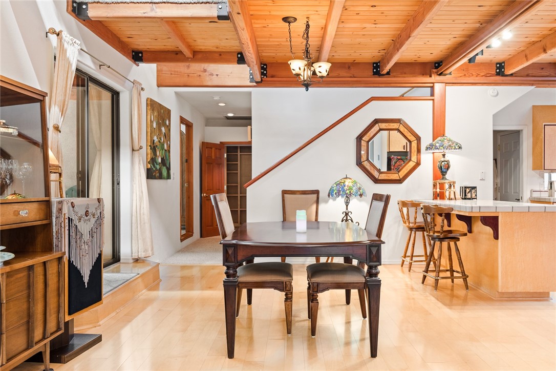 16366 Morro Road Atascadero, CA 93422 - Photo 8 of 69 a dining room with furniture and a floor to ceiling window