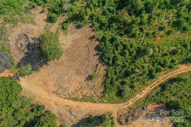 a view of a lake and green space