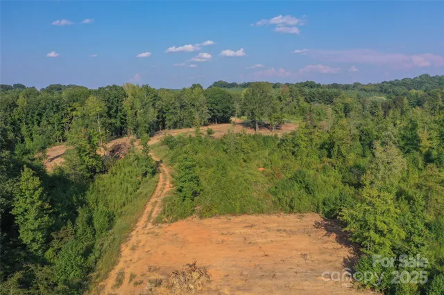 a view of a lake with a yard