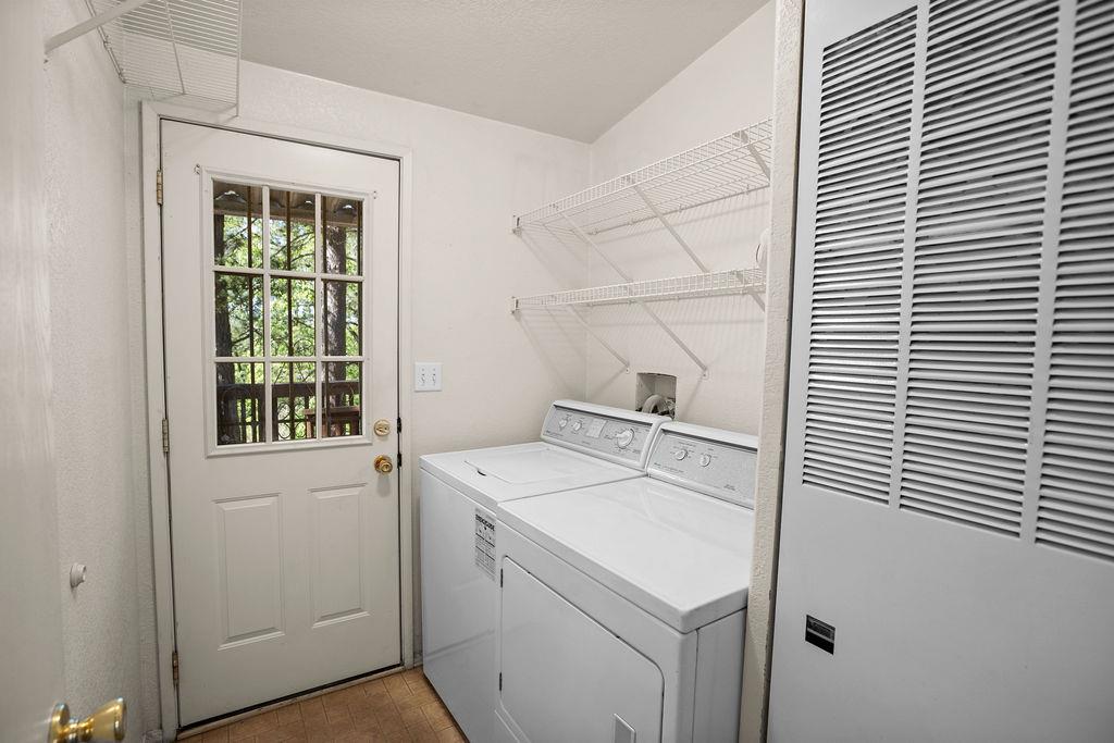 1281 Pleasant Valley Road, Unit 44 Diamond Springs, CA 95619 - Photo 22 of 27 a utility room with dryer and washer