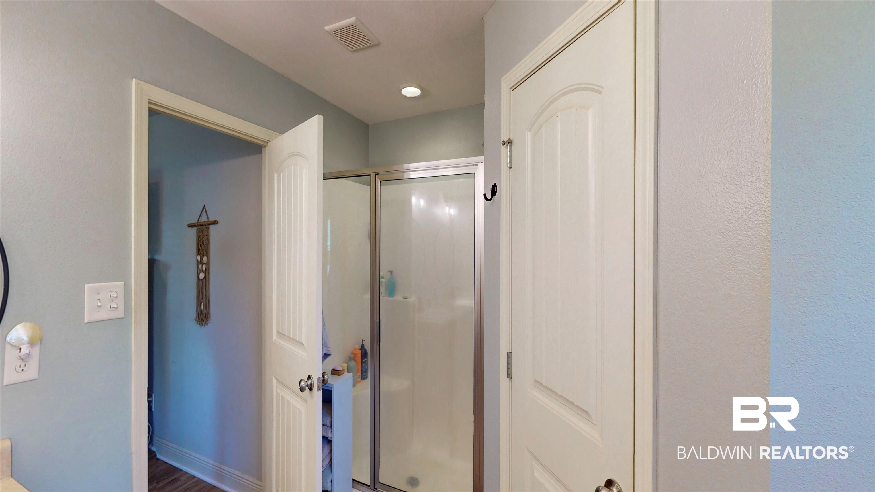 1304 Majesty Loop Foley, AL 36535 - Photo 16 of 44 Bathroom featuring a stall shower and baseboards