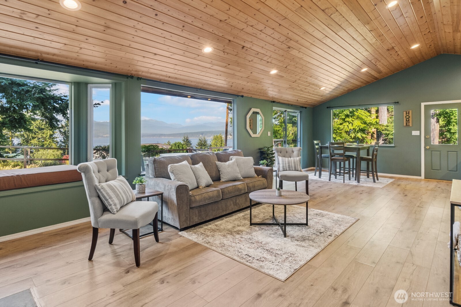 71 Quinault Loop Port Townsend, WA 98368 - Photo 13 of 29 a living room with furniture and a large window