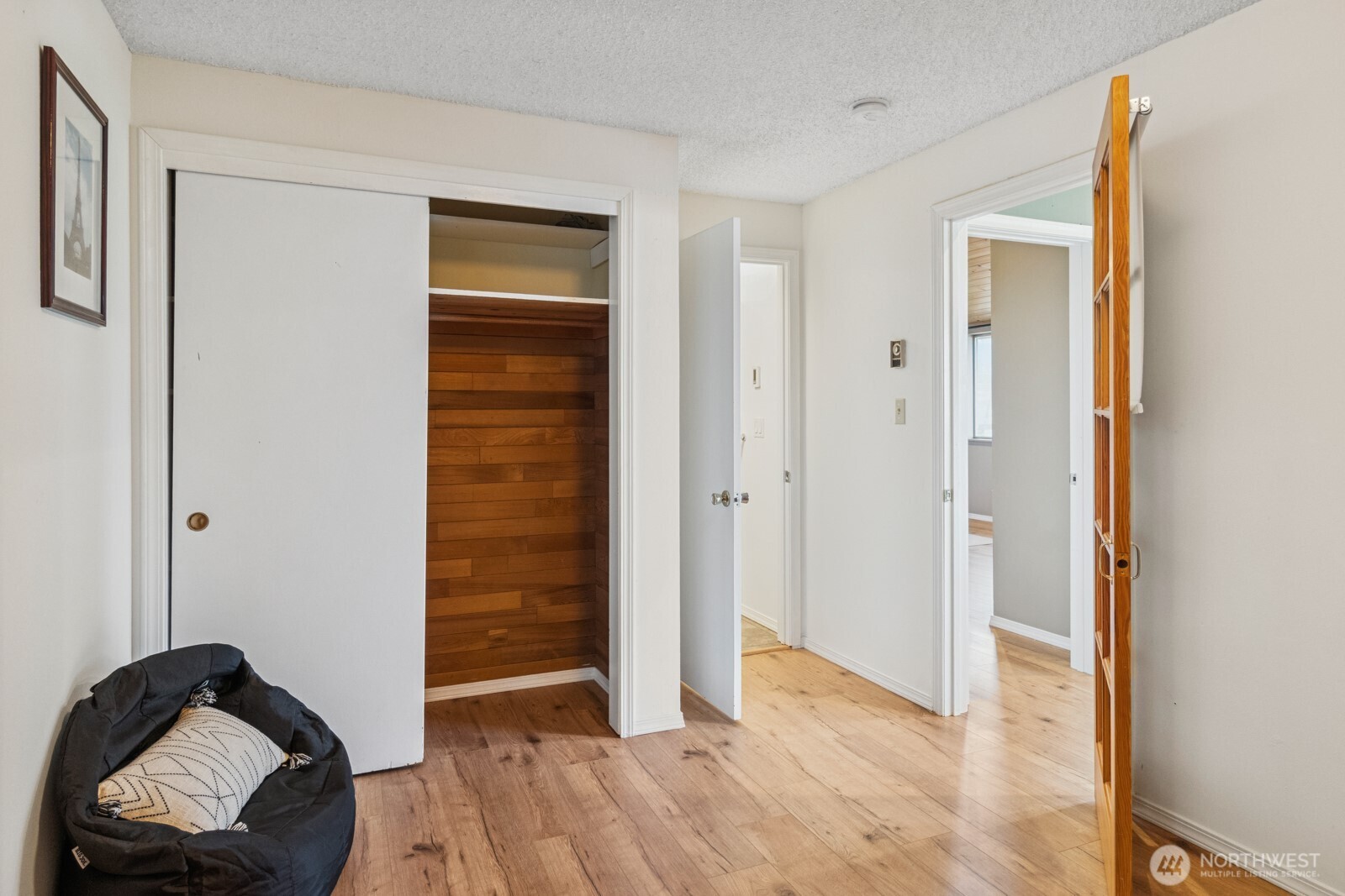 71 Quinault Loop Port Townsend, WA 98368 - Photo 20 of 29 a view of a livingroom with wooden floor and closet