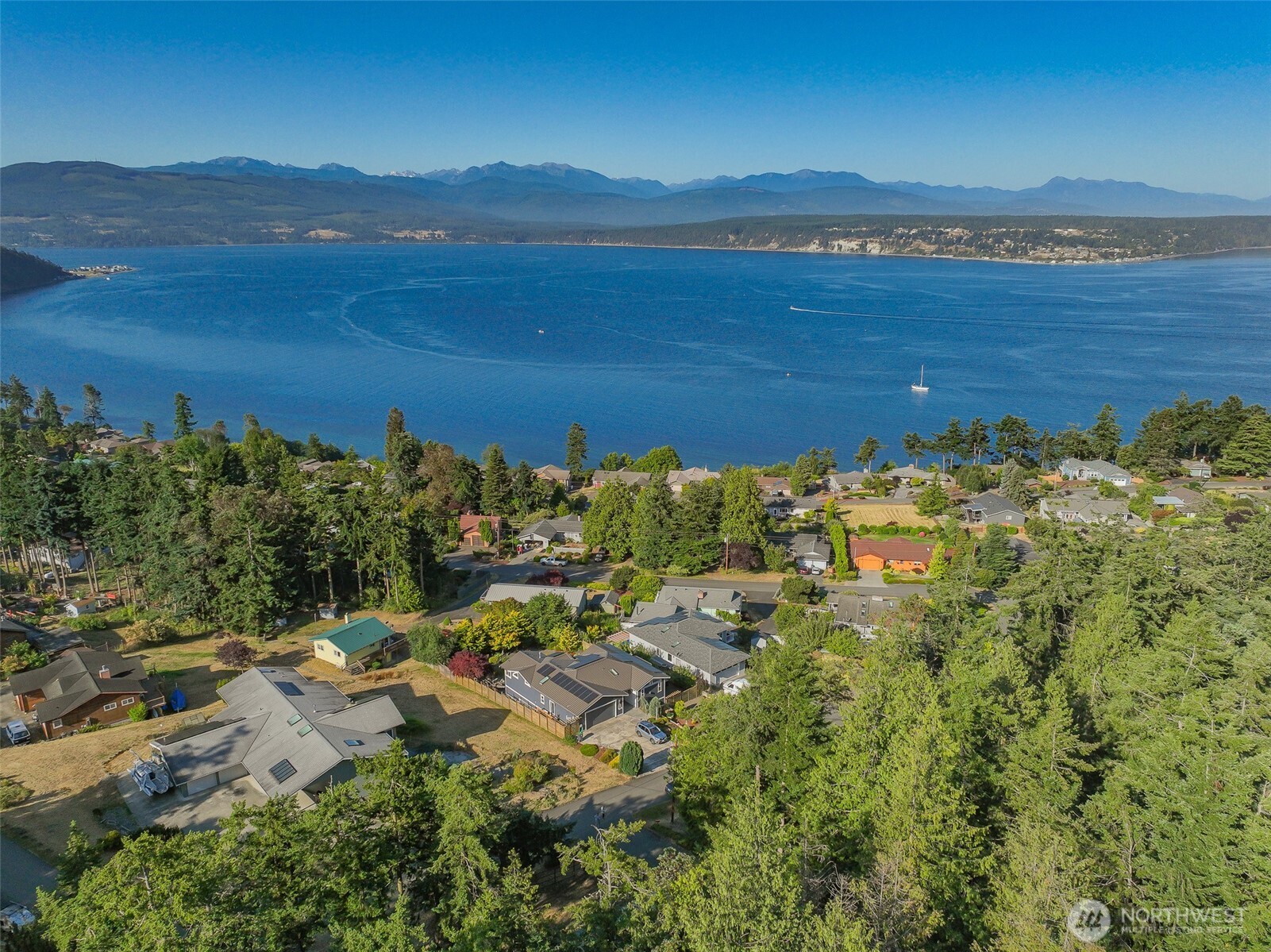 71 Quinault Loop Port Townsend, WA 98368 - Photo 25 of 29 a view of a lake with a mountain