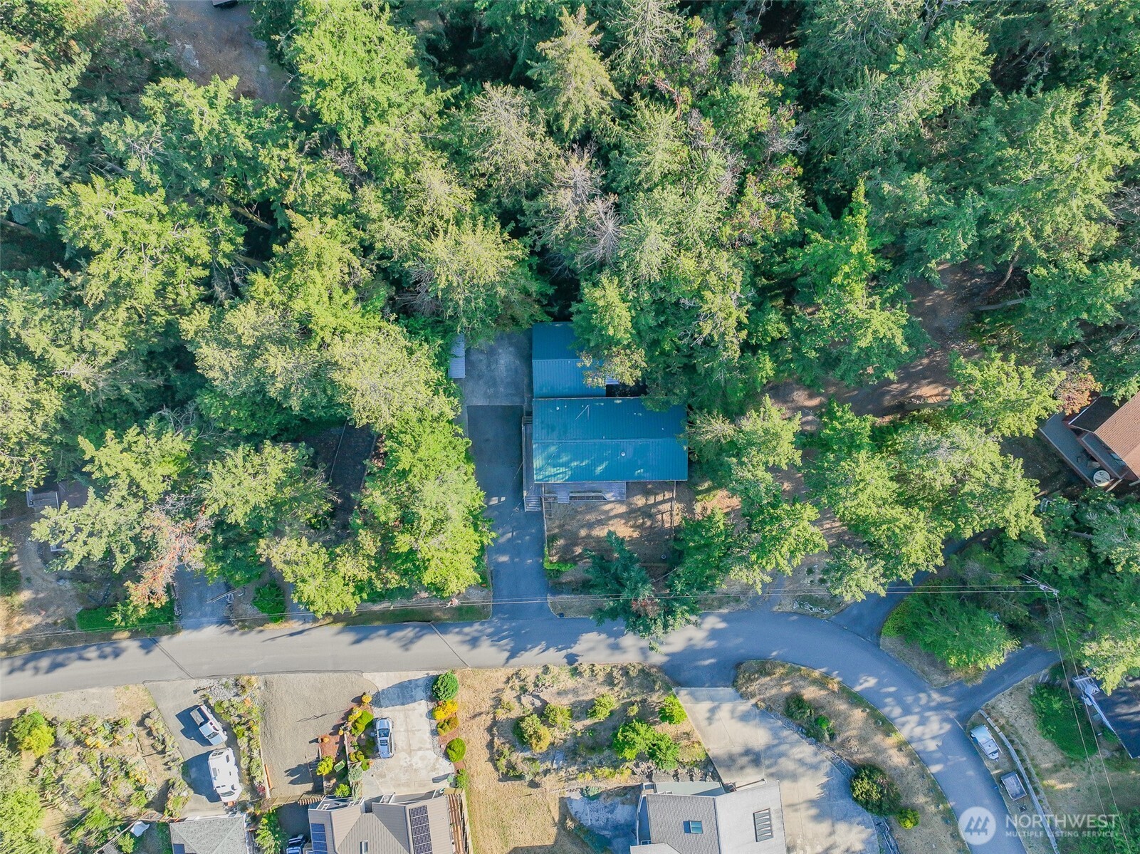 71 Quinault Loop Port Townsend, WA 98368 - Photo 28 of 29 an aerial view of a house with a yard