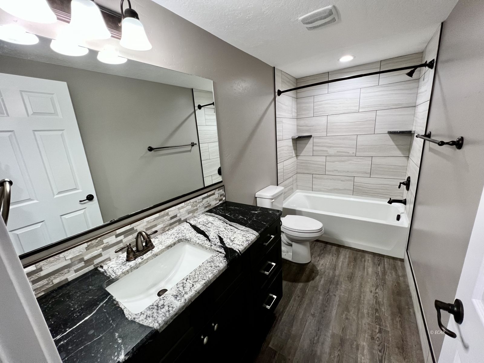 298 Ridgeway Drive Spring Creek, NV 89815 - Photo 41 of 45 a bathroom with a sink a toilet and shower