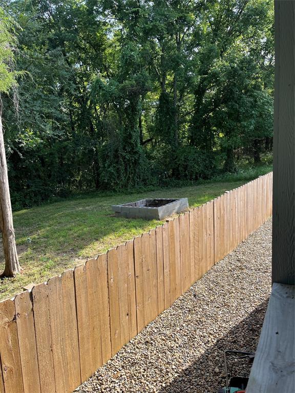 615 Waterfront Row Quitman, TX 75783 - Photo 7 of 7 a view of a wooden fence