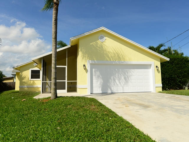 6487 Mullin Street Jupiter, FL 33458 - Photo 1 of 15 Exterior Front