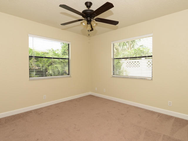 6487 Mullin Street Jupiter, FL 33458 - Photo 13 of 15 Guest Bedroom