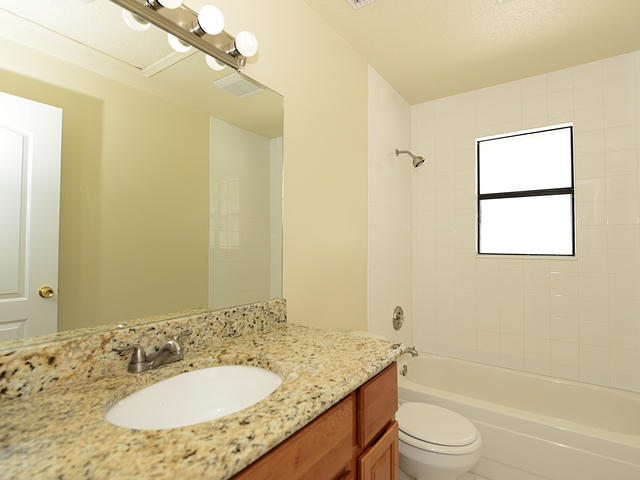 6487 Mullin Street Jupiter, FL 33458 - Photo 14 of 15 Guest Bedroom
