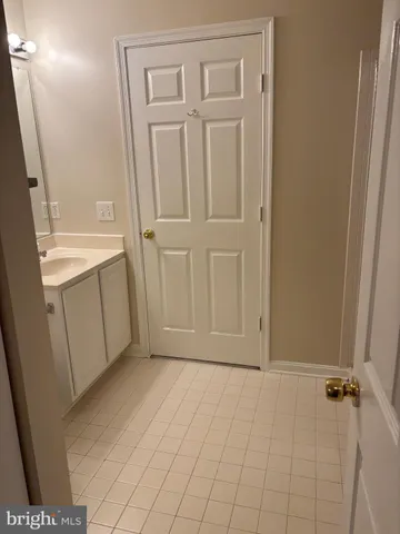 a view of an entryway with bathroom