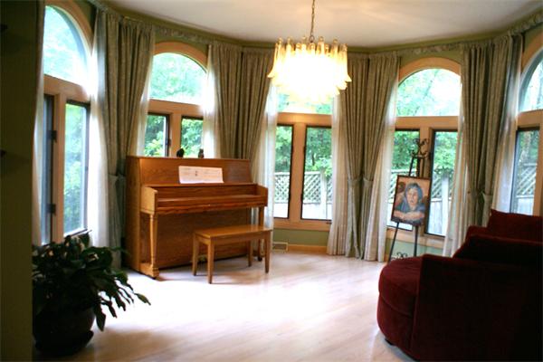 50 Strawberry Lane Canton, MA 02021 - Photo 9 of 28 a living room with furniture and a large window