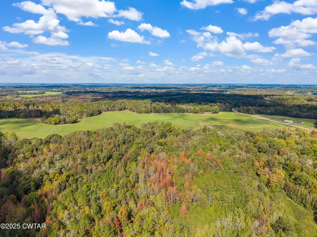 a view of an ocean and city