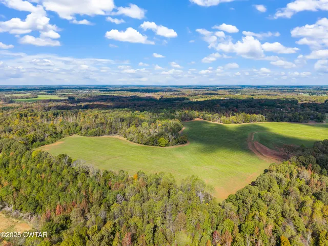a view of a lake in a sunset