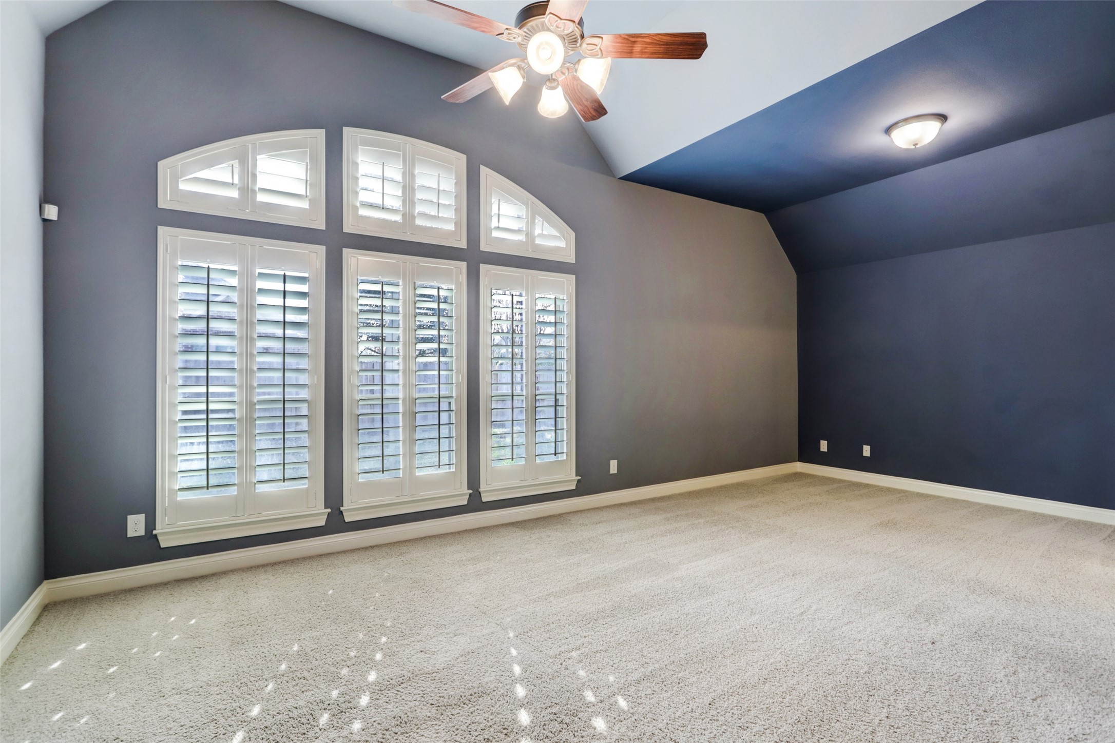 13506 Breakwater Path Loop Houston, TX 77044 - Photo 16 of 42 Primary Suite with reading nook and view of the back yard.