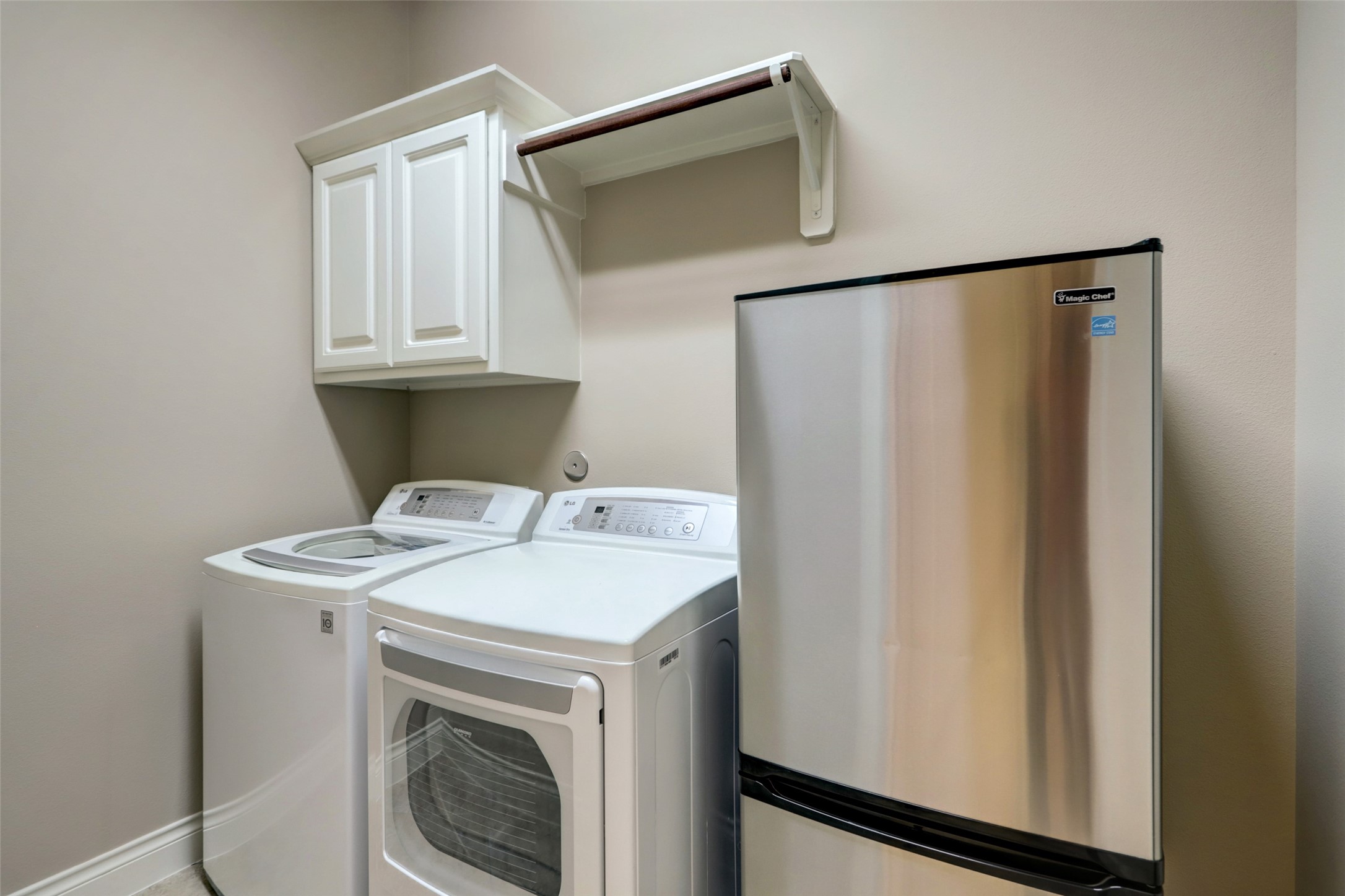 13506 Breakwater Path Loop Houston, TX 77044 - Photo 27 of 42 Laundry room with included washer and dryer.