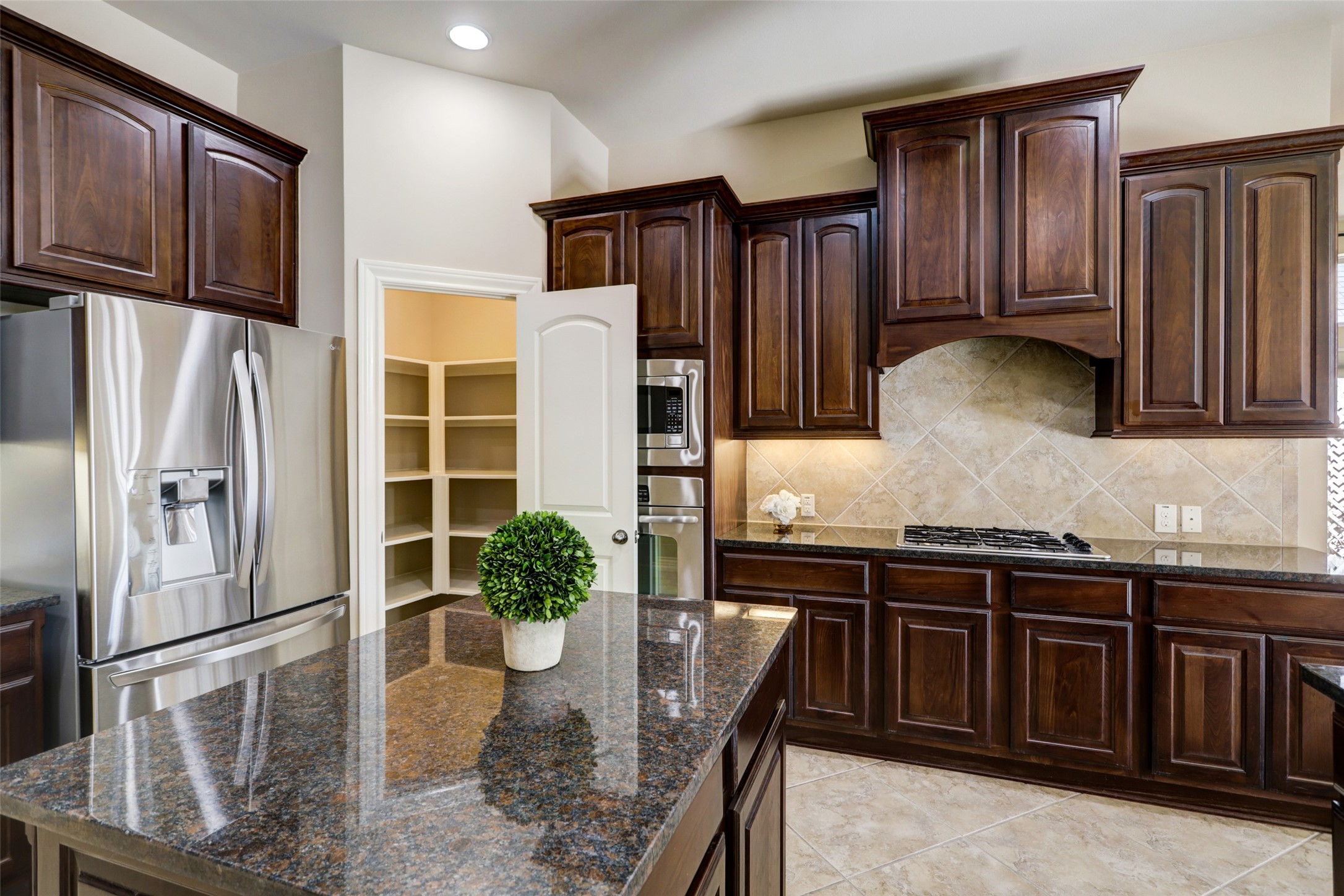 13506 Breakwater Path Loop Houston, TX 77044 - Photo 9 of 42 Walk-in pantry with tons of staorage.
