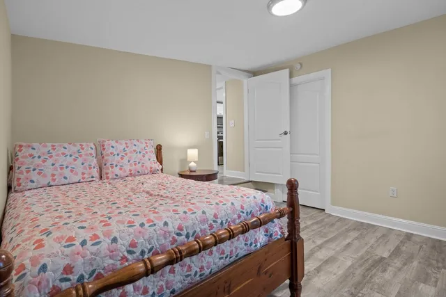 a bedroom with a bed and a cabinets
