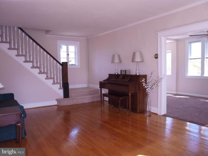 520 Wilton Road Towson, MD 21286 - Photo 12 of 13 a view of a livingroom with furniture and hardwood floor