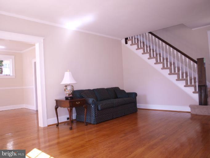 520 Wilton Road Towson, MD 21286 - Photo 8 of 13 a living room with furniture and a wooden floor
