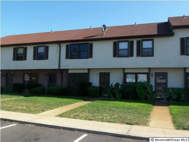1080 Sawmill Road Brick, NJ 08724 - Photo 1 of 3 a front view of a house with garden